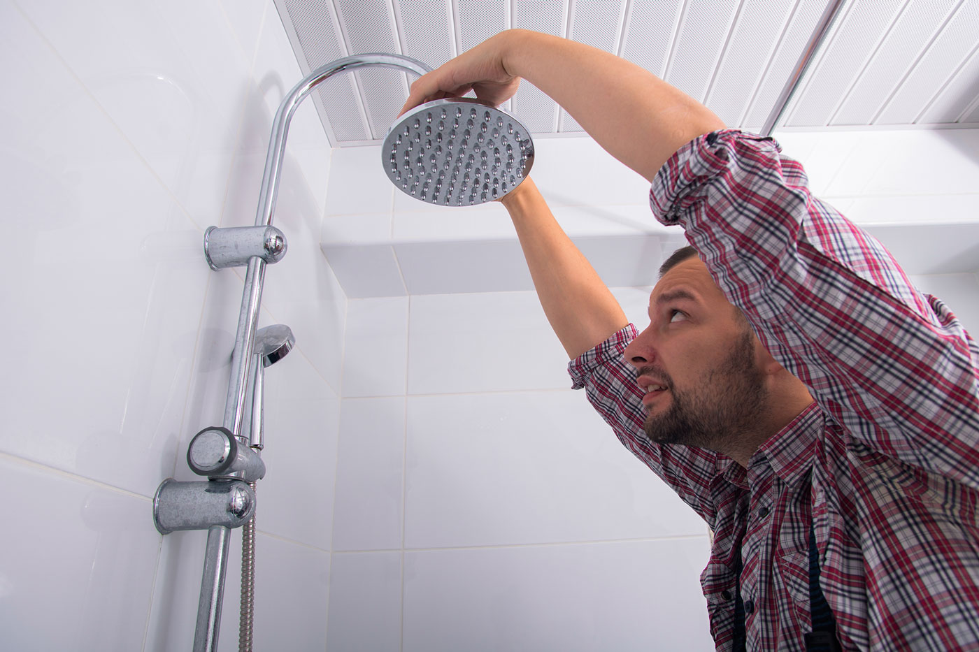 plumber fixing a shower